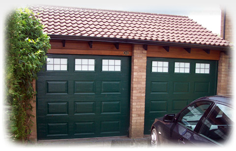 A photo of a pair of adjoining garage doors